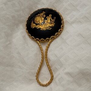 Elegant Black and Gold Hand Mirror